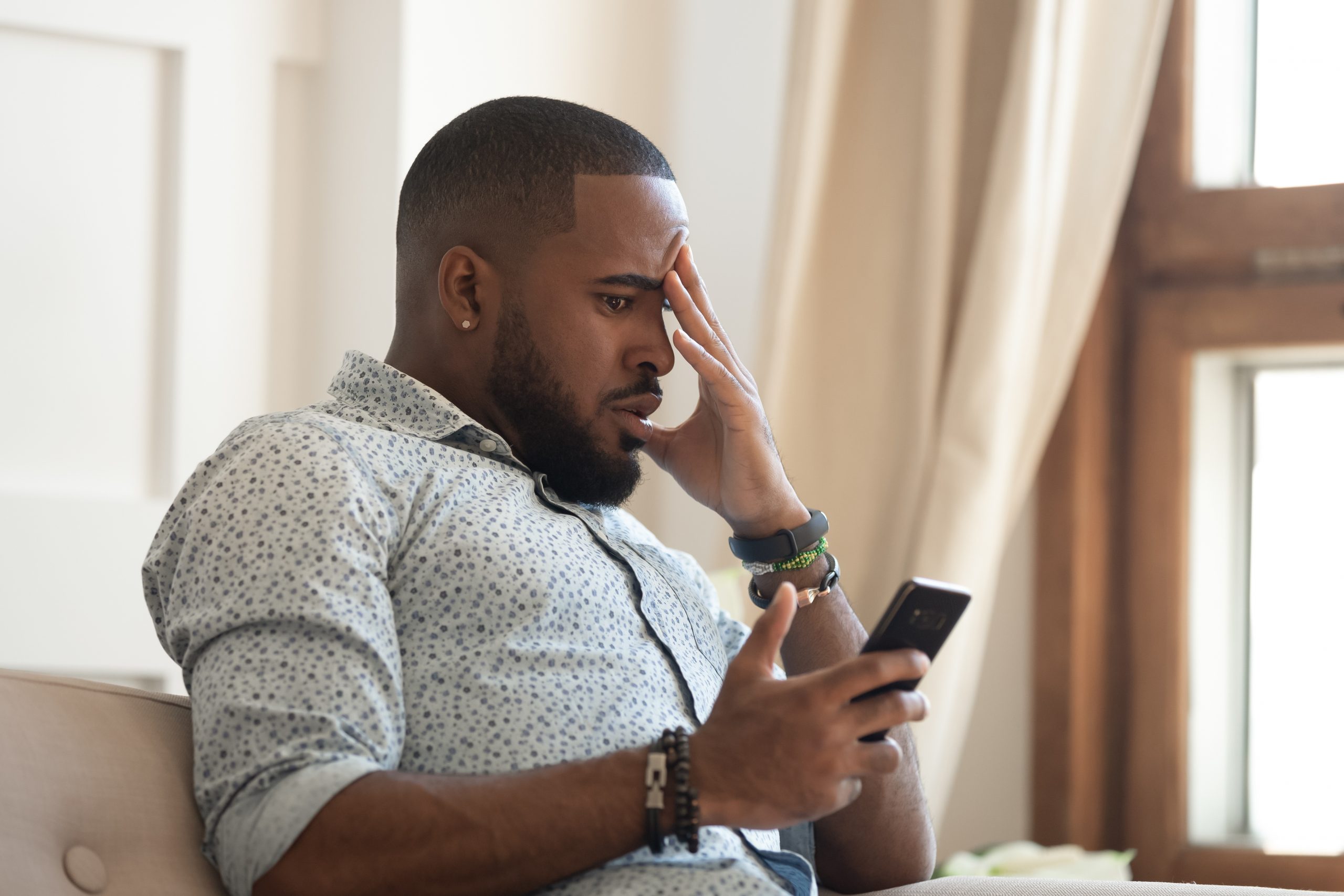 frustrated man on phone